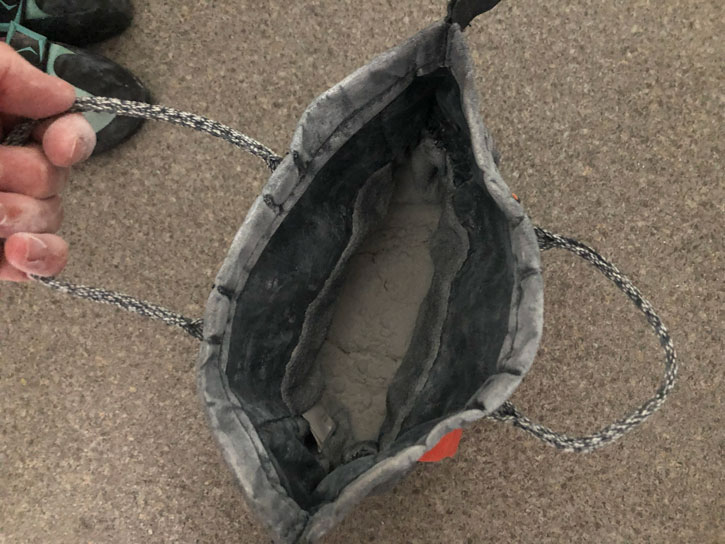 use a bouldering bucket instead of a chalk bag for bouldering. 