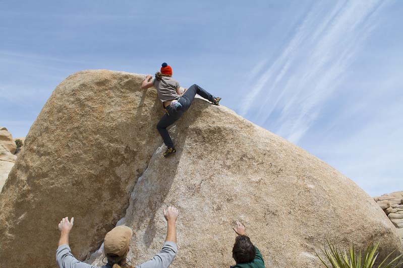 rock over to top out a boulder problem